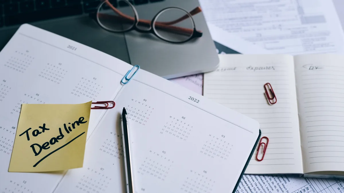 Desk calendar and paperwork illustrating the first-year filing deadlines of an Italian company