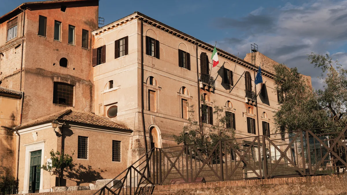 An Italian public administration building flying the national flag