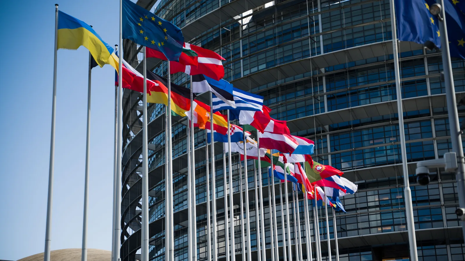 European Union flags outside an EU institution building