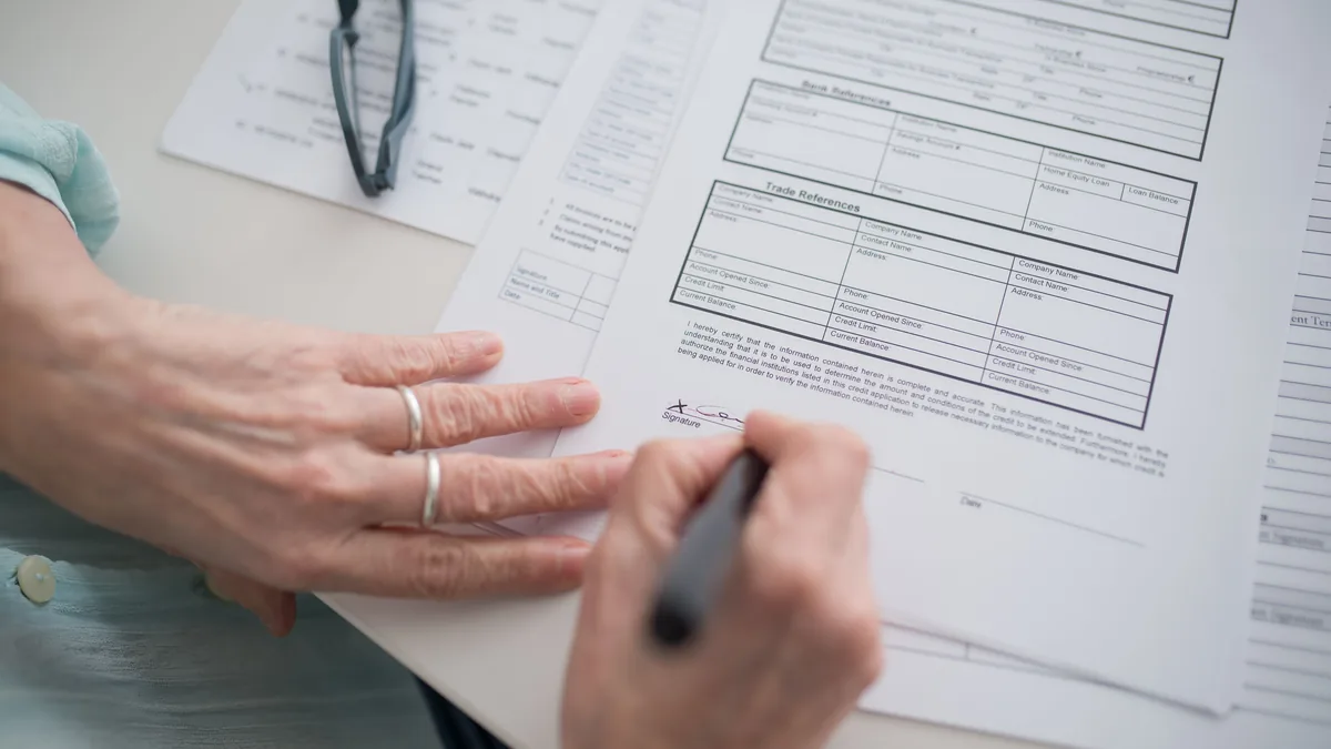 Signing a printed document with a pen