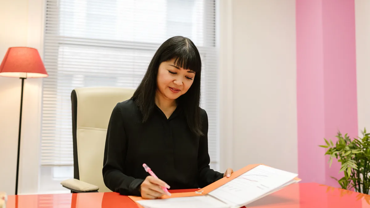 Reviewing registration paperwork for an Italian representative office