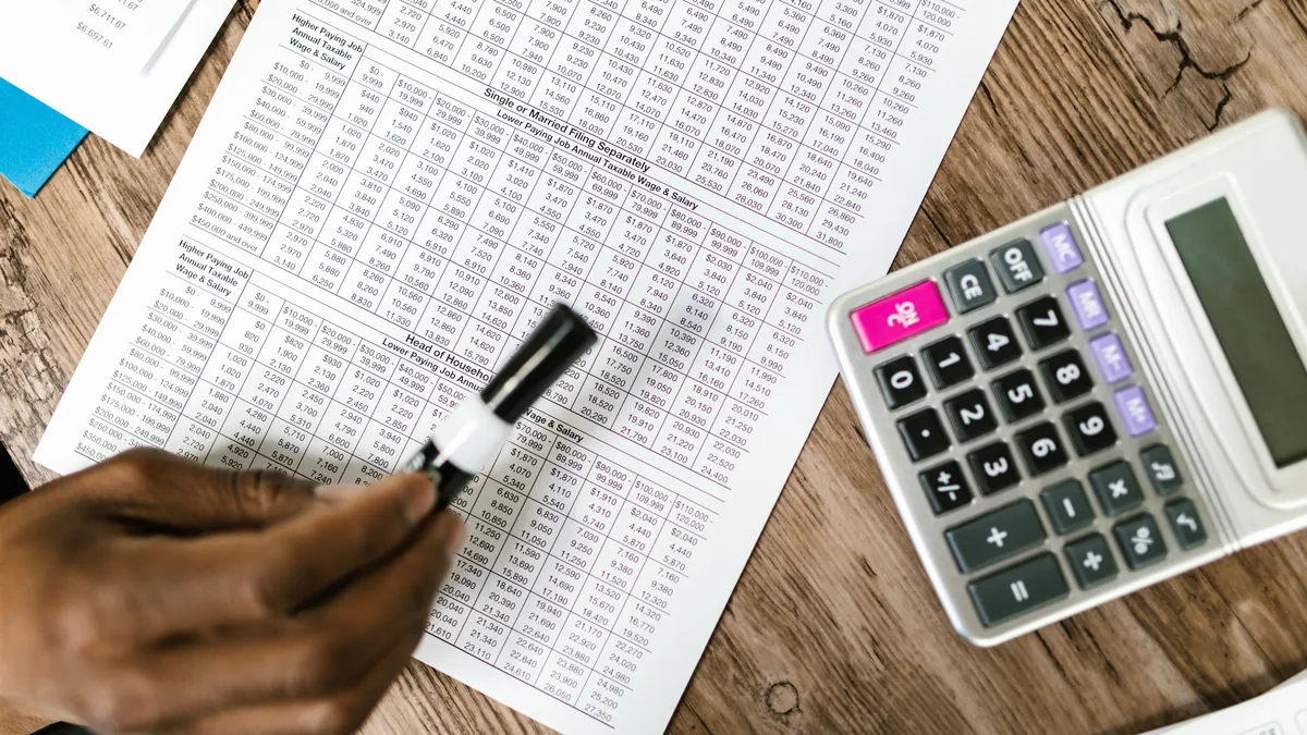 Reviewing foreign income documents to calculate Italian double-taxation relief.