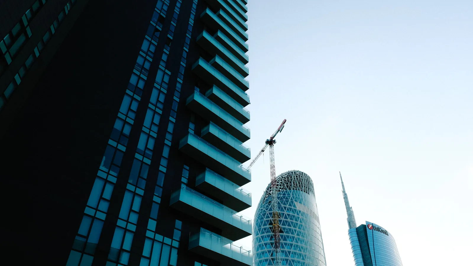 A modern office building facade in Milan, where many Italian trademark applicants register their businesses